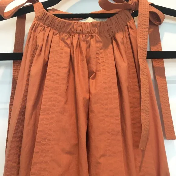 Ulla Johnson orange high neck with ties belted waist 3 layers of ruffles at hem
